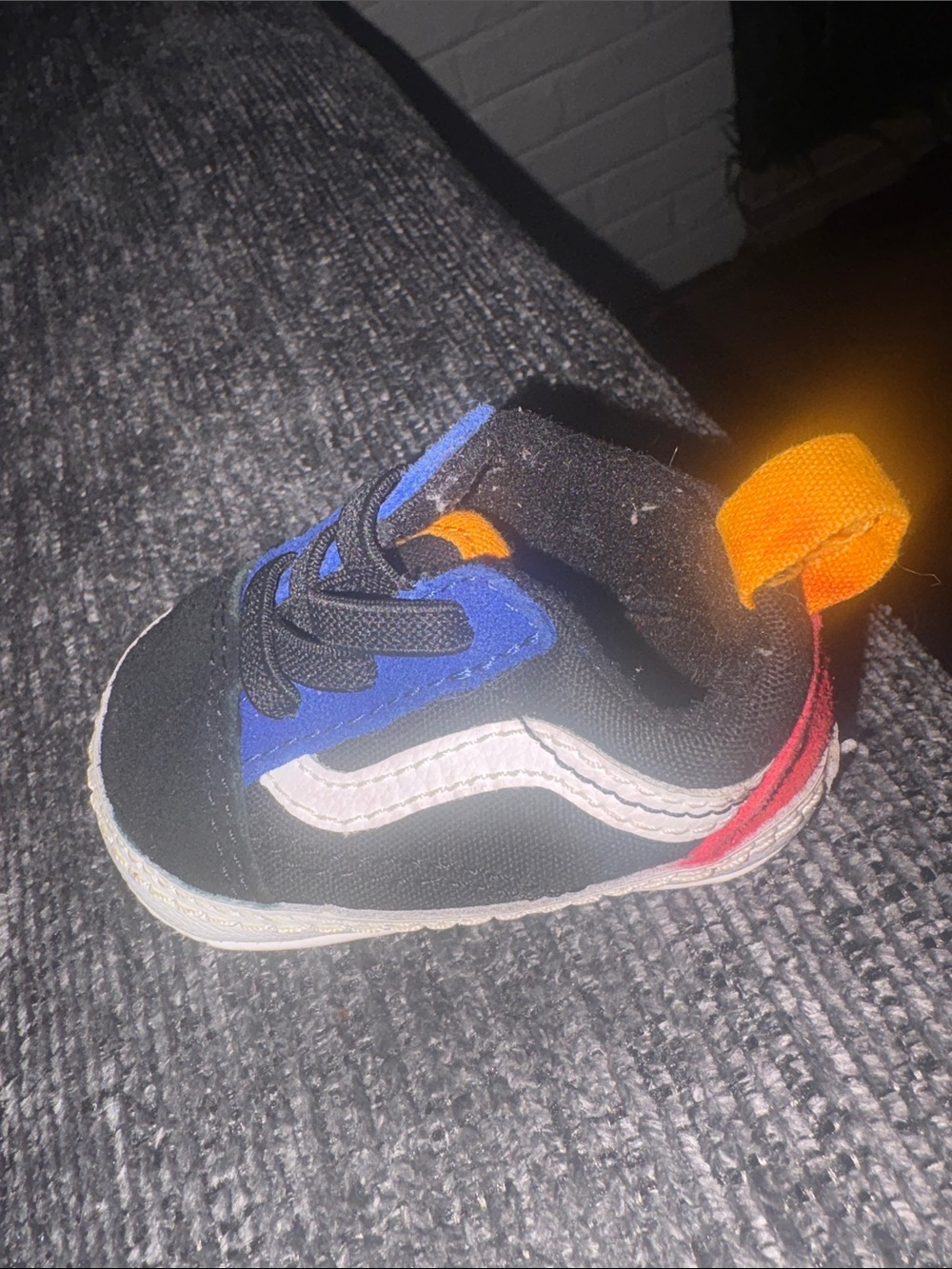 Vans Baby Walker Shoe in Black with Blue and Orange Highlights